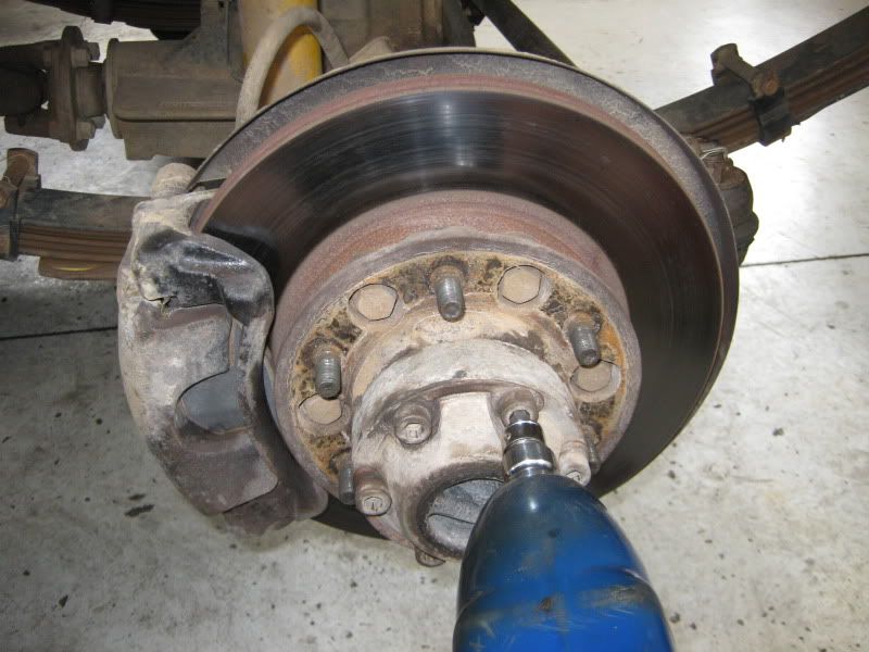 How to tighten nissan patrol wheel bearings